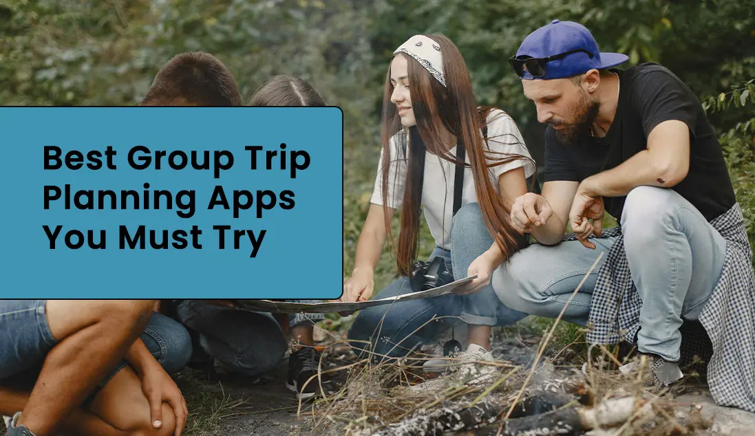 A group of people on a trip going over a plan