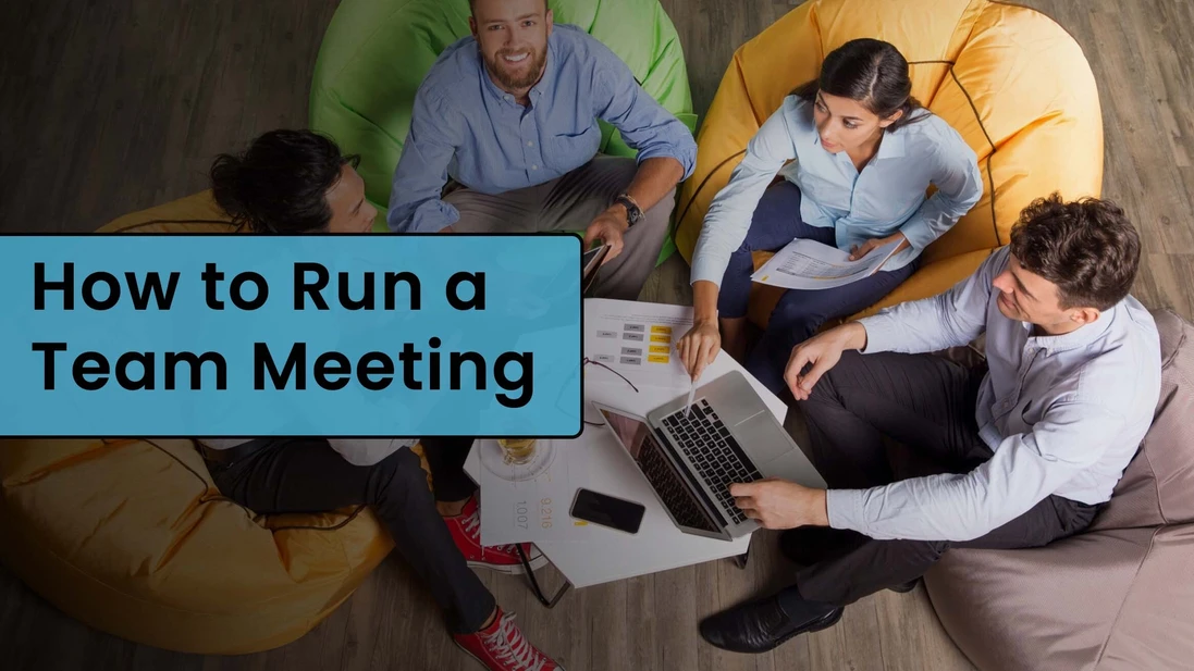 a small group of people in a meeting