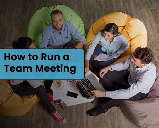 a small group of people in a meeting